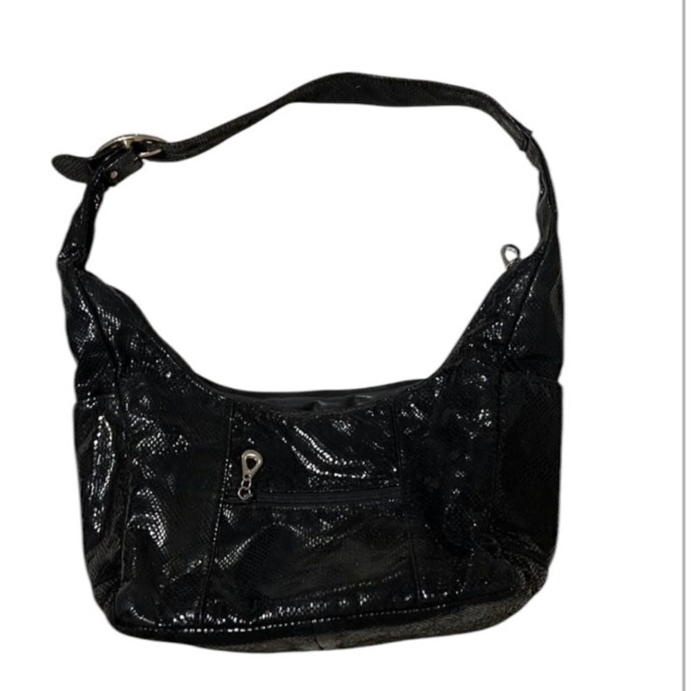 Fabulous preloved handbag 4 outside pockets adjustable strap 1 inside pocket GUC